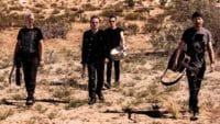 Picture of Irish rockers U2 walking through the desert