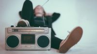ultimate song lyric quiz girl with foot on boombox